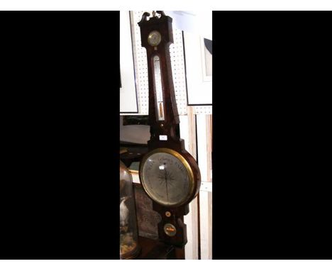 A 19th century wheel barometer/thermometer by Copini, Shoreditch 