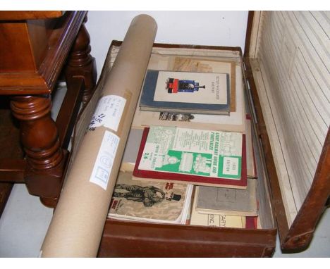 A vintage trunk full of railway related books, together with plans in a tube 