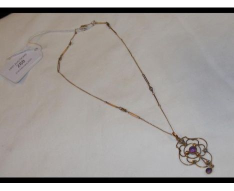 An Edwardian amethyst and seed pearl pendant on chain  