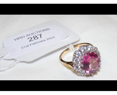 A pink stone dress ring in 9ct gold setting 