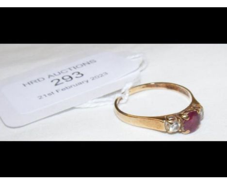 A ruby and diamond dress ring in 9ct setting