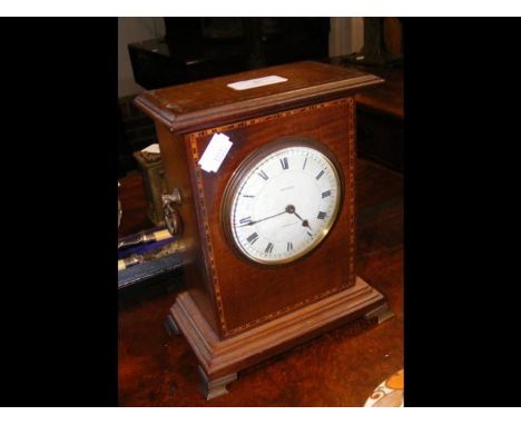 A small Edwardian mantel clock - 21cms high