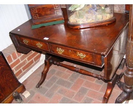 A sofa table with two drawers to the front