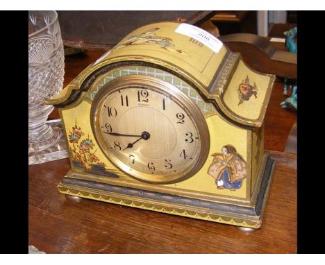 A 15cm high Asprey mantel clock in the Japanned style CONDITION REPORTIn our judgement, lot is offered in ticking order. Smal