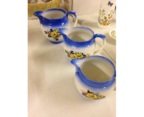 Set of 3 vintage graduated jugs with blue and floral design
