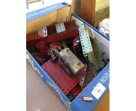 Box of vintage Meccano with a stationary steam engine.