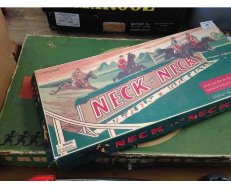 A vintage boxed tinplate table football game c.1960s with a boxed Schylling "Neck and Neck" tinplate horse racing game