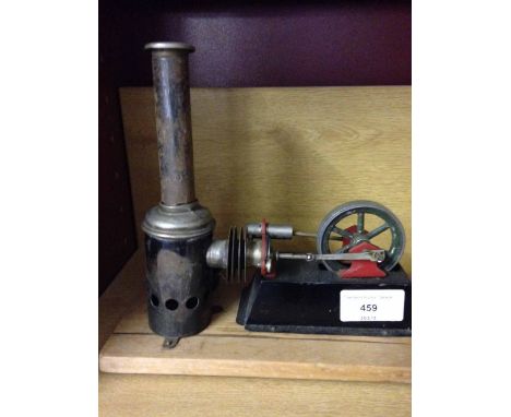 A Mamod style stationary steam engine.