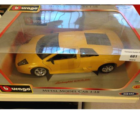 A boxed Bburago yellow Lamborghini: Murcielago 1:18 scale