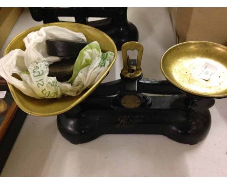 Set of vintage Boots the Chemist iron weighing scales with brass bowl and weights.