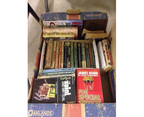 Approx 45 vintage 'James Bond' and 'The Saint' hardback and paperback novels by Ian Fleming and Leslie Charteris.