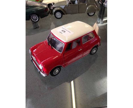 An unboxed Kyosho 1:18 scale red Morris Mini Cooper 1275 S Mk 1