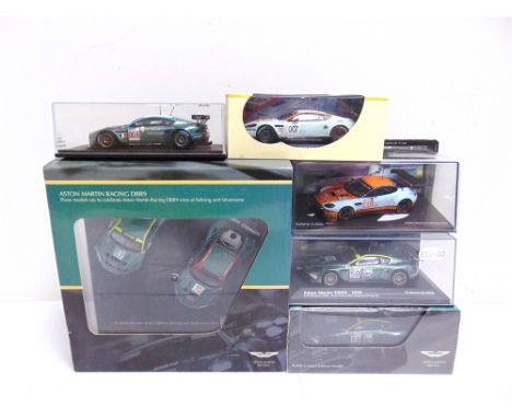 SIX 1/43 SCALE DIECAST &amp; RESIN MODEL RACING CARS comprising an Aston Martin Racing Collection No.05-AMR-JT-43, DBR9 at Se