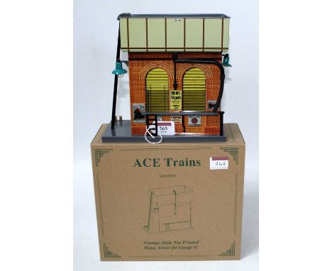 An ACE trains vintage style tin printed water tower ref AC/2, with instructions (M-BM)