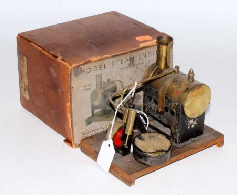 A Mersey Model Co small spirit fired steam engine with burner and instructions in original box, model would benefit from clea