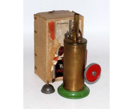 A "Burnac" variable speed spirit fired steam engine complete with burner, chimney and filler funnel in original box with inst