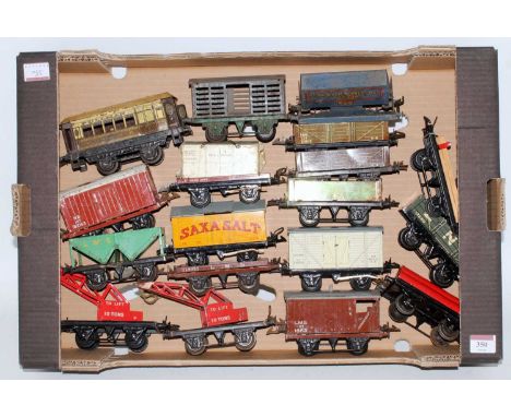 A large tray of 18 Hornby mainly post-war goods wagons including NE no.1 goods van, LNE M open, 2 x no.1 crane trucks, 2 x LM