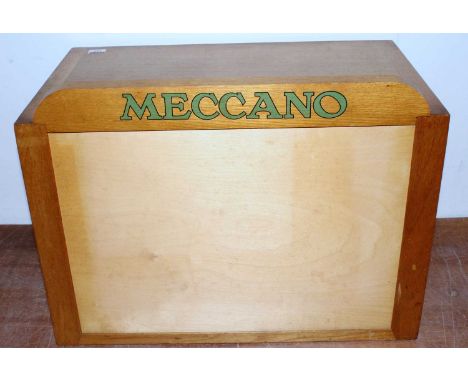 Meccano 6-drawer dealer's cabinet, complete with header board, light oak, containing mixture of miscellaneous parts blue/gold