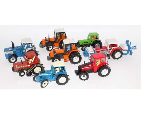 Eight various loose Britains farm tractors to include a Fiat 880 DT track type tractor, a Massey Ferguson 2680 tractor with s