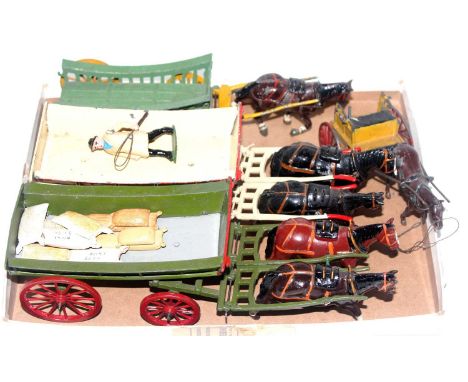 Four various Britains and Charbens horse drawn farming implements and effects to include a repainted Britains horsedrawn farm