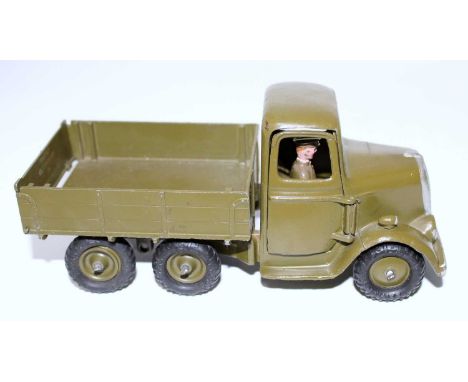 A Britains No. 1335 1948 6-wheel Army lorry with driver figure complete with round nose cab, loose example (VG)