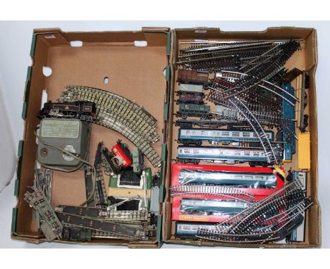 Two trays of mixed model railway items Hornby Dublo. 2 rail standard 2-6-4 tank engine charged couplings, 2 Hornby diesel loc