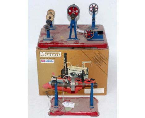 A Mamod boxed steam engine and loose line shaft accessory group to include a Mamod SP4 stationary steam plant housed in the o