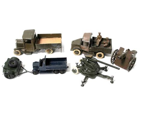 A selection of various Britains and Dinky Toys military vehicles and accessories to include No. 1877 Beetle lorry, a Britains