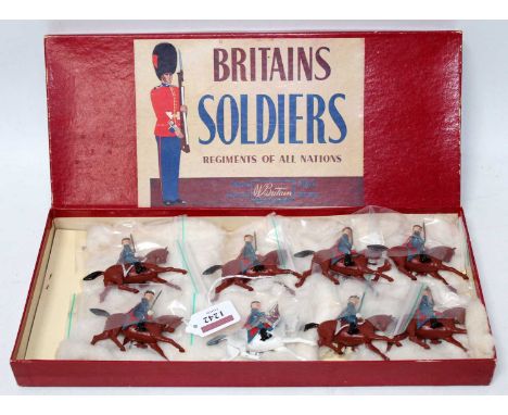 A Britains set No. 2018 The Guard Hussar Regiment of the Danish Army in Review Order comprising of one officer with drawn sab