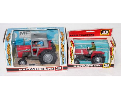A Britains farm tractor window boxed diecast group to include No. 9520 Massey Ferguson tractor with driver, together with a B