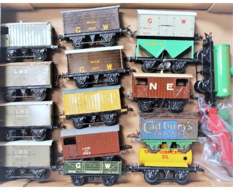 Large tray of 16 Hornby wagons mix of pre war and post war, 3 x LMS Banana, 2 x LMS goods brake, 2 x GW Milk, LMS Insulmeat, 