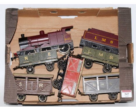 A small tray containing a maroon Lima 0-6-0 loco no. 4683 with 6-wheel LMS tender (NM), Bassett- Lowke NE open (G), Bassett L