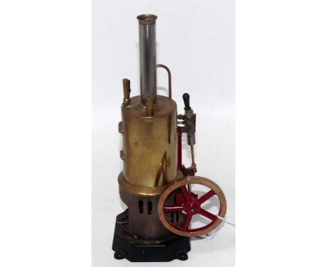 A Bing stationary vertical steam engine comprising of single vertical boiler with burner, powering a single vertical oscillat