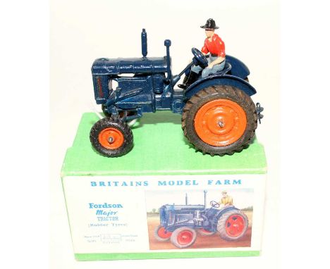 A Britains model farm series No. 128F Fordson Major tractor comprising of blue body with orange hubs and rubber tyres, comple