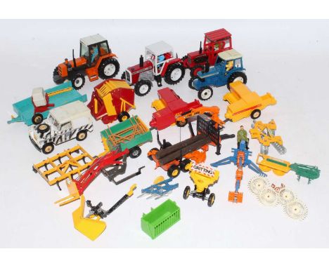 One tray containing a quantity of various loose Britains tractors and farm implements, examples to include a Renault 145 14 t