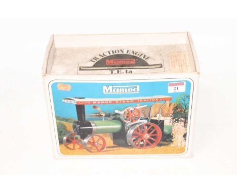 A Mamod TE1A traction engine of usual specification, sold with steering rod, scuttle, and burner, housed in the original all-