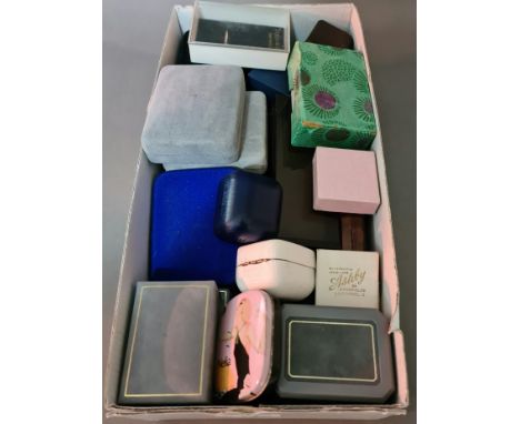 A collection of empty vintage jewellery boxes. 