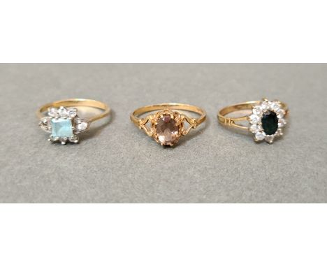 A group of three hallmarked 9ct gold cluster rings, sizes L/M, M/N and O/P, gross wt. 4.9g. 