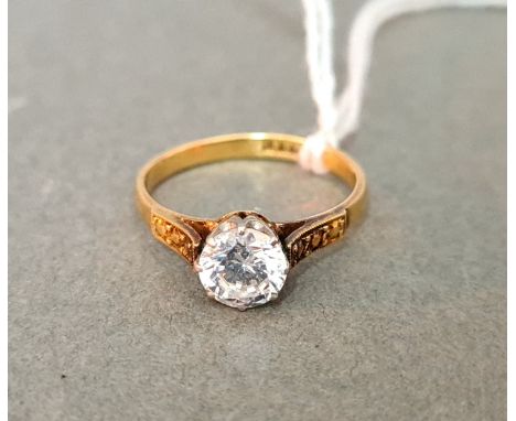 A ring marked '18ct', size L, gross wt. 2.3g. 