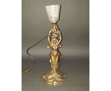 An Art Nouveau spelter lamp with later John Ditchfield glass shade, height 43cm. 