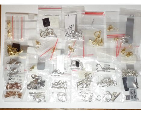 Assorted 925 jewellery making spares comprising clasps and fasteners, including bolt ring, lobster claw, toggles etc. 