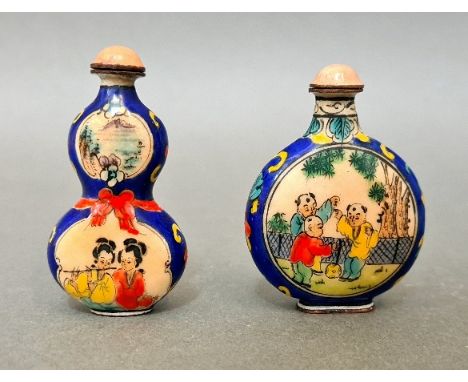 Two 20th century Chinese enamel on copper snuff bottles. 