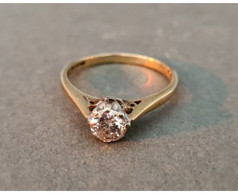 A hallmarked 9ct gold diamond solitaire ring, gross wt. 1.8g. 
