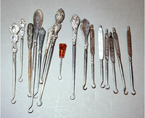 A collection of 10 Victorian button hooks, most with silver handles and six Victorian advertising button hooks. 