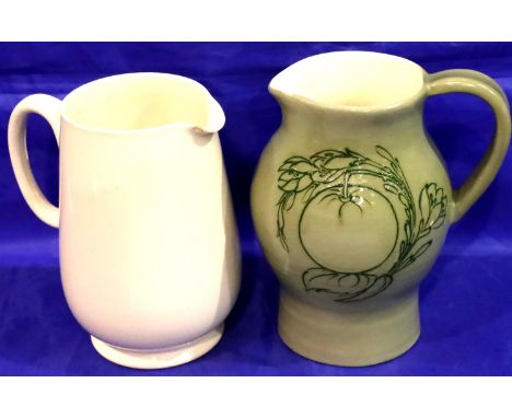 Moorcroft green ground milk jug, H: 15 cm, signed to base and a cream ground Moorcroft jug. Green jug with light crazing and 