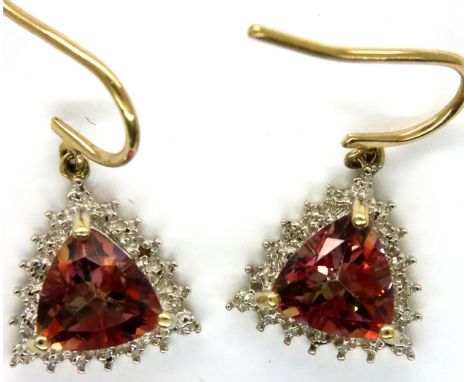 9ct gold topaz and diamond set earrings, combined 3.0g. P&amp;P Group 1 (£14+VAT for the first lot and £1+VAT for subsequent 
