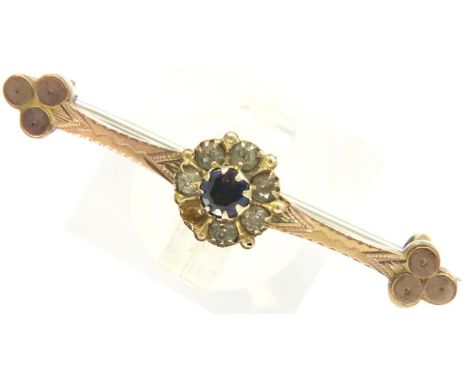 9ct gold brooch set with blue and white stone, L: 32 mm, 1.5g. One stone missing. P&amp;P Group 1 (£14+VAT for the first lot 