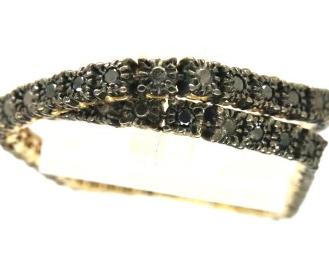 9ct gold black diamond set tennis bracelet, diamond weight totals approximately 0.5cts, L: 18 cm, 6.3g. P&amp;P Group 1 (£14+