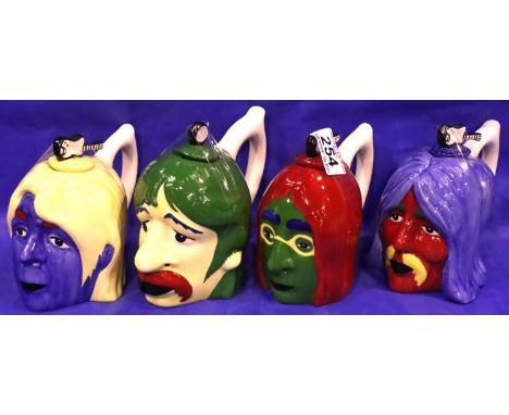 Four Lorna Bailey Beatle head teapots in the Andy Warhol style, H: 13 cm. No cracks, chips or visible restoration. P&amp;P Gr