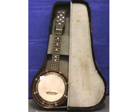 Cased four string banjolele, L: 52 cm. P&amp;P Group 3 (£25+VAT for the first lot and £5+VAT for subsequent lots) 